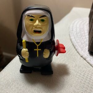 1997 Nunzilla Wind-Up Nun Toy with Black and White Outfit